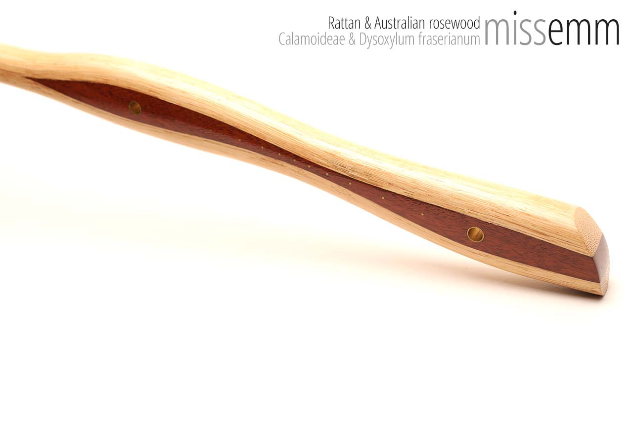 Unique spanking toys | Rattan pane (flat bladed cane) | By kink artisan Miss Emm | The shaft is made from rattan cane and the handle has been handcrafted from Australian rosewood with brass details.