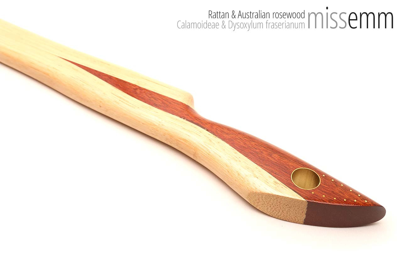 Unique spanking toys | Rattan pane (flat bladed cane) | By kink artisan Miss Emm | The shaft is made from rattan cane and the handle has been handcrafted from Australian rosewood with brass details.