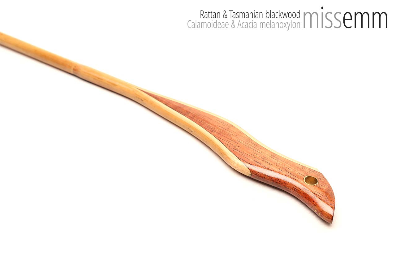 Handmade bdsm toys | Rattan cane | By kink artisan Miss Emm | The cane shaft is rattan cane and the handle has been handcrafted from Tasmanian blackwood with brass details.