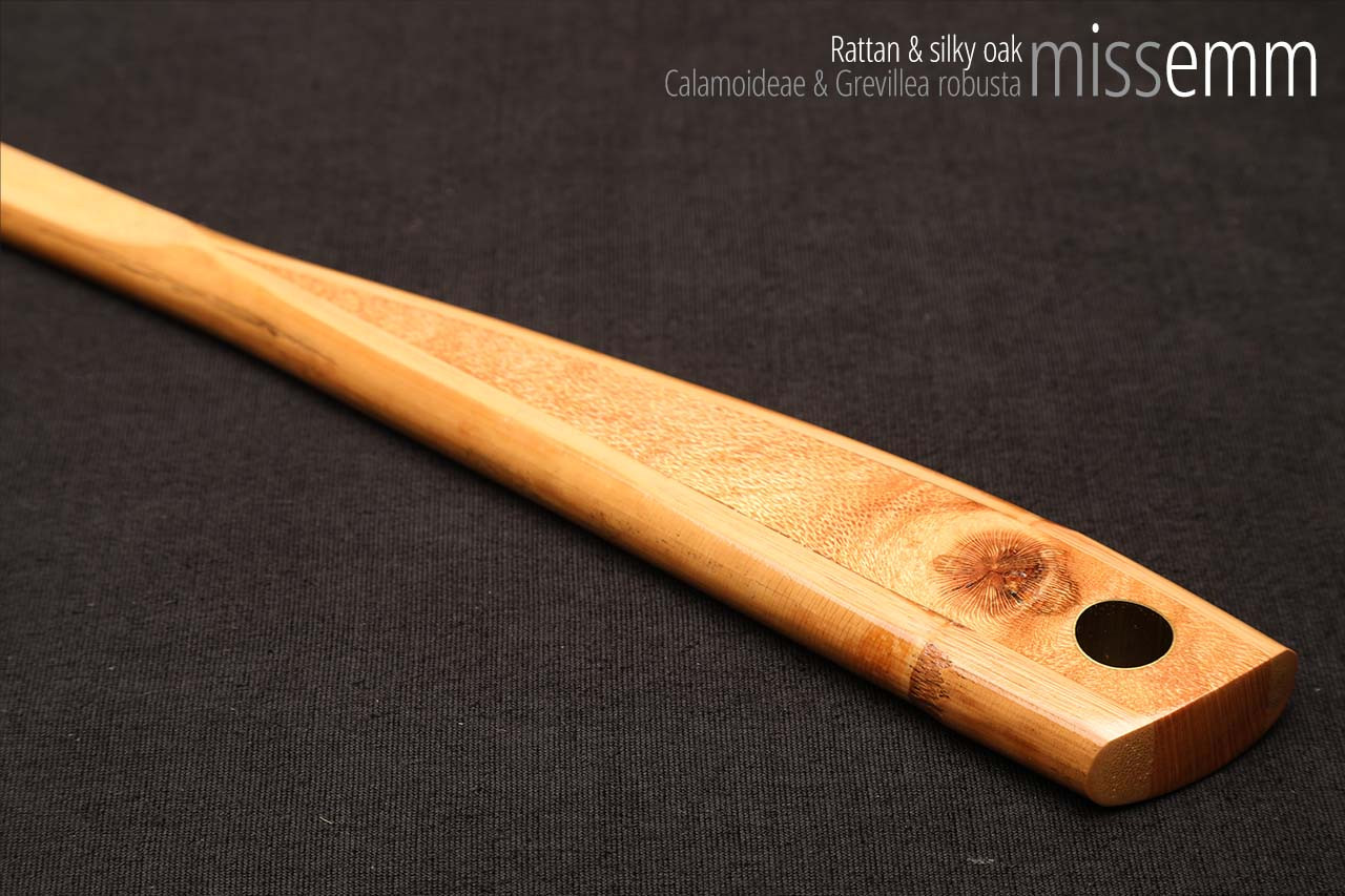 Unique spanking toys | Rattan pane (flat bladed cane) | By kink artisan Miss Emm | The shaft is made from rattan cane and the handle has been handcrafted from silky oak with brass details.