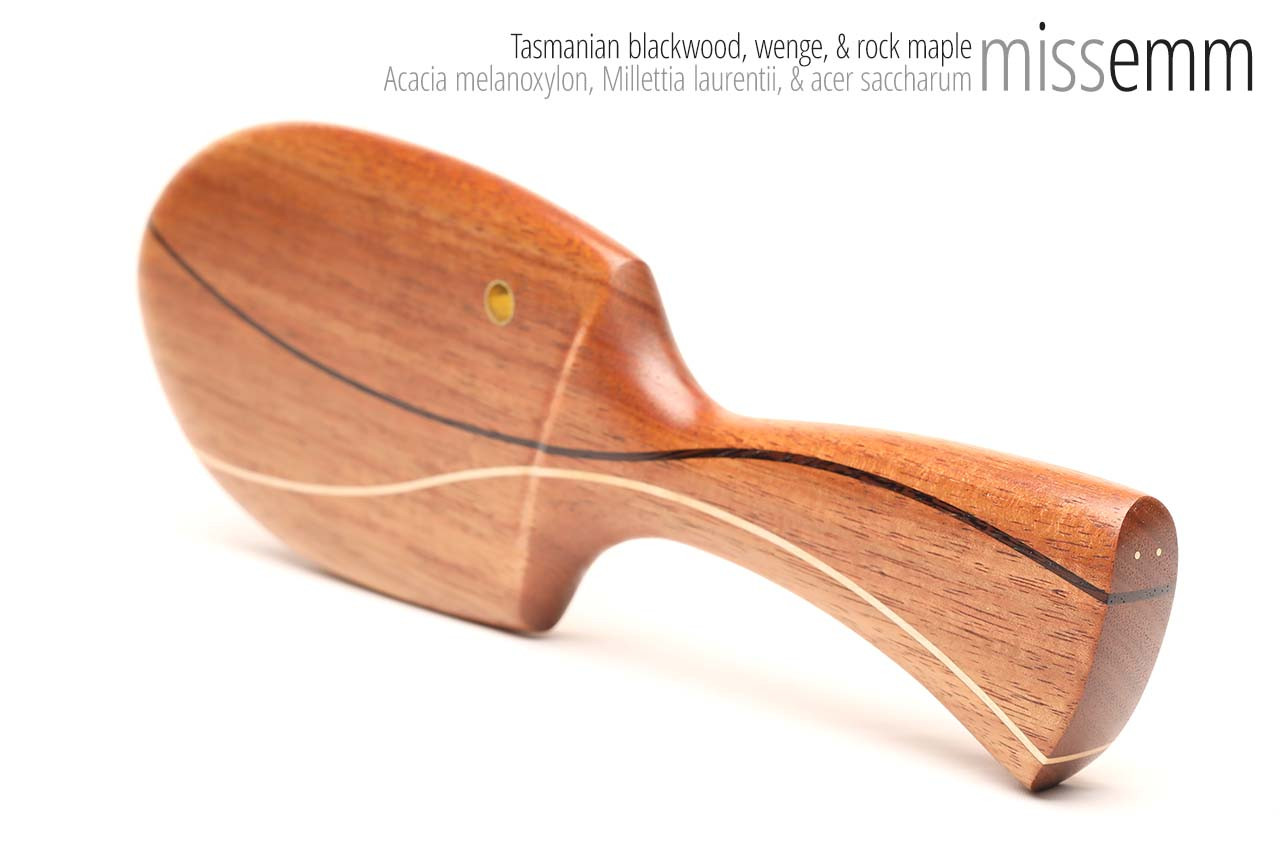 Unique handcrafted spanking toys | Wooden paddle | By kink artisan Miss Emm | Made from Tasmanian blackwood with brass details.