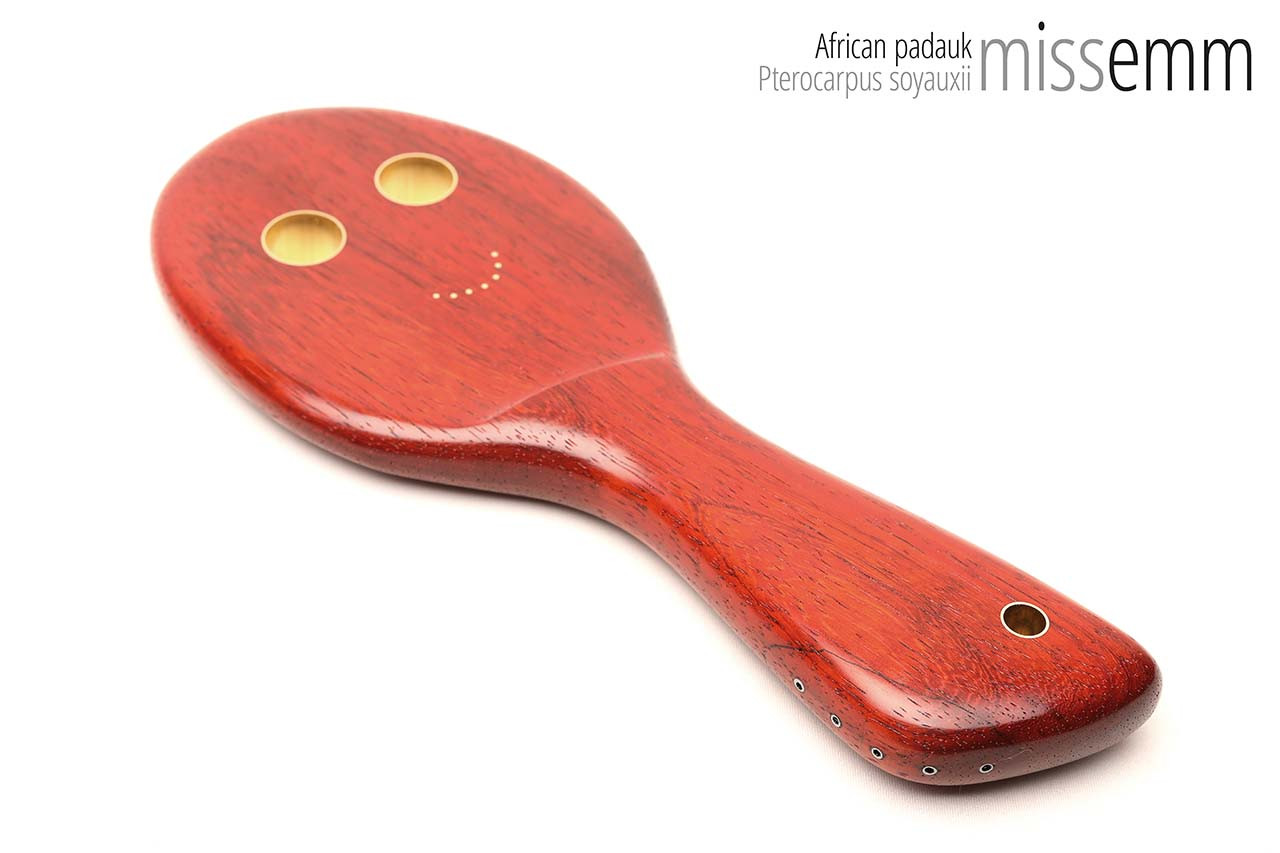 Unique handcrafted spanking toys | Wooden paddle | By kink artisan Miss Emm | Made from African padauk with brass details.