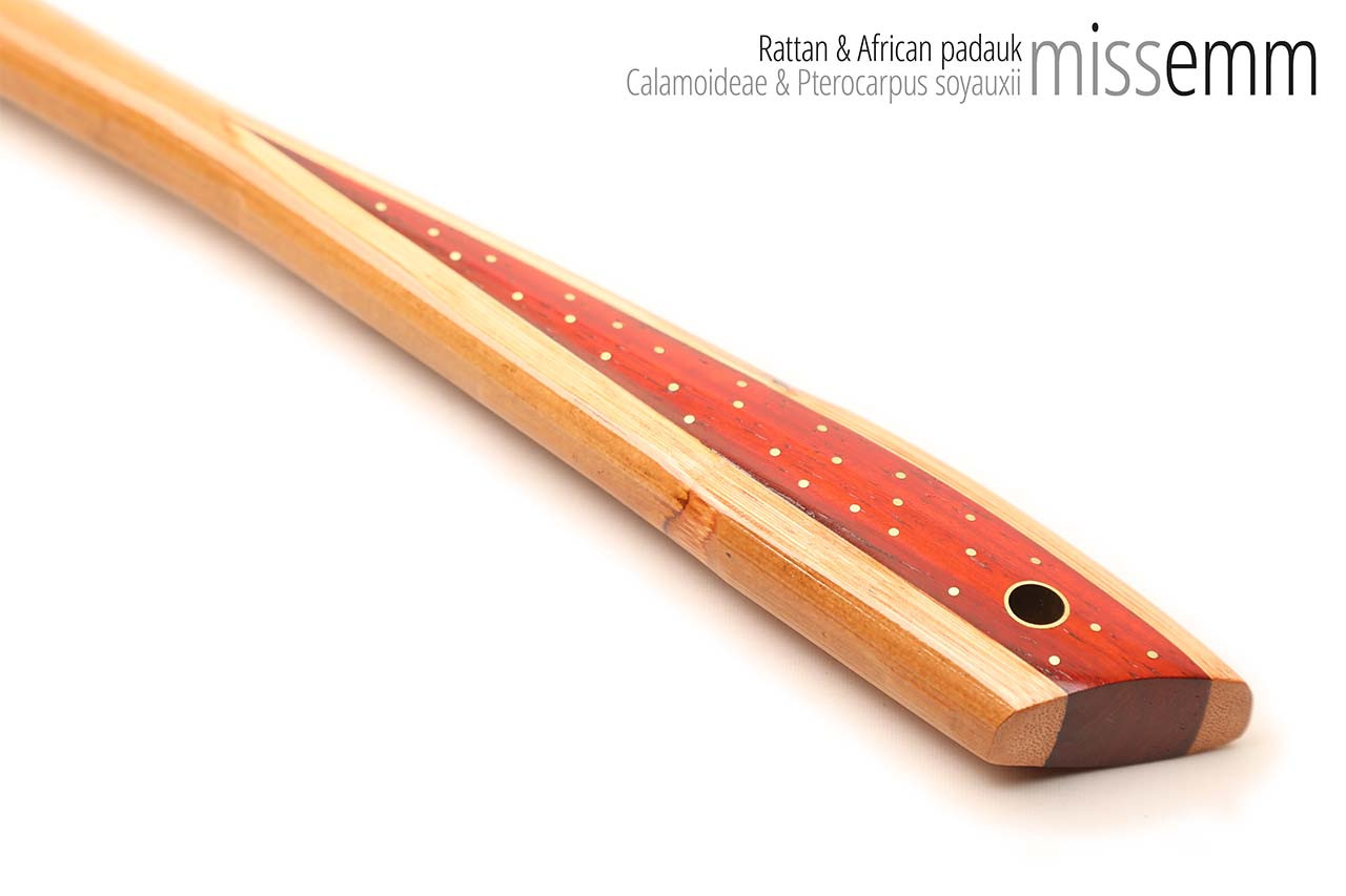 Handmade bdsm toys | Rattan cane | By kink artisan Miss Emm | The cane shaft is rattan cane and the handle has been handcrafted from African padauk with brass details.