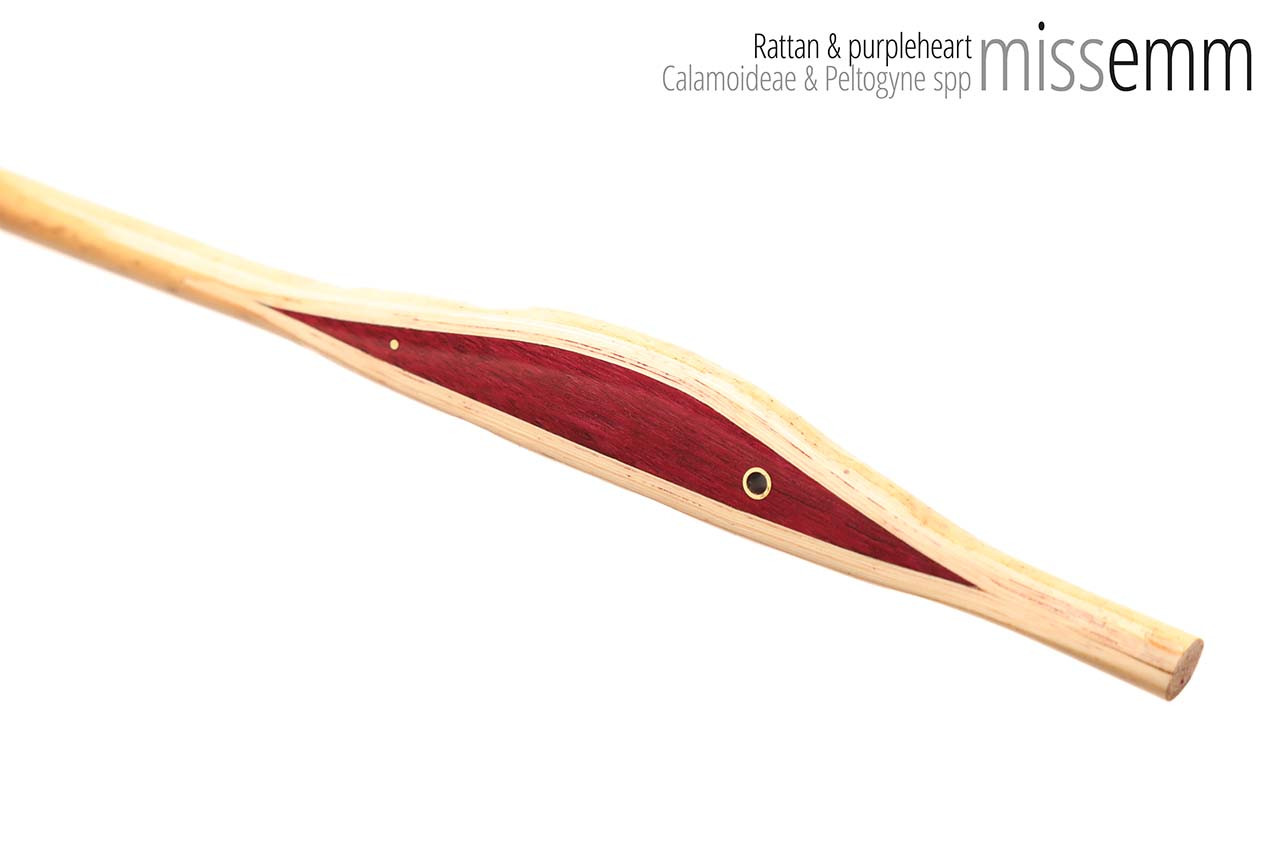 Handmade bdsm toys | Rattan cane | By kink artisan Miss Emm | The cane shaft is rattan cane and the handle has been handcrafted from purpleheart with brass details.