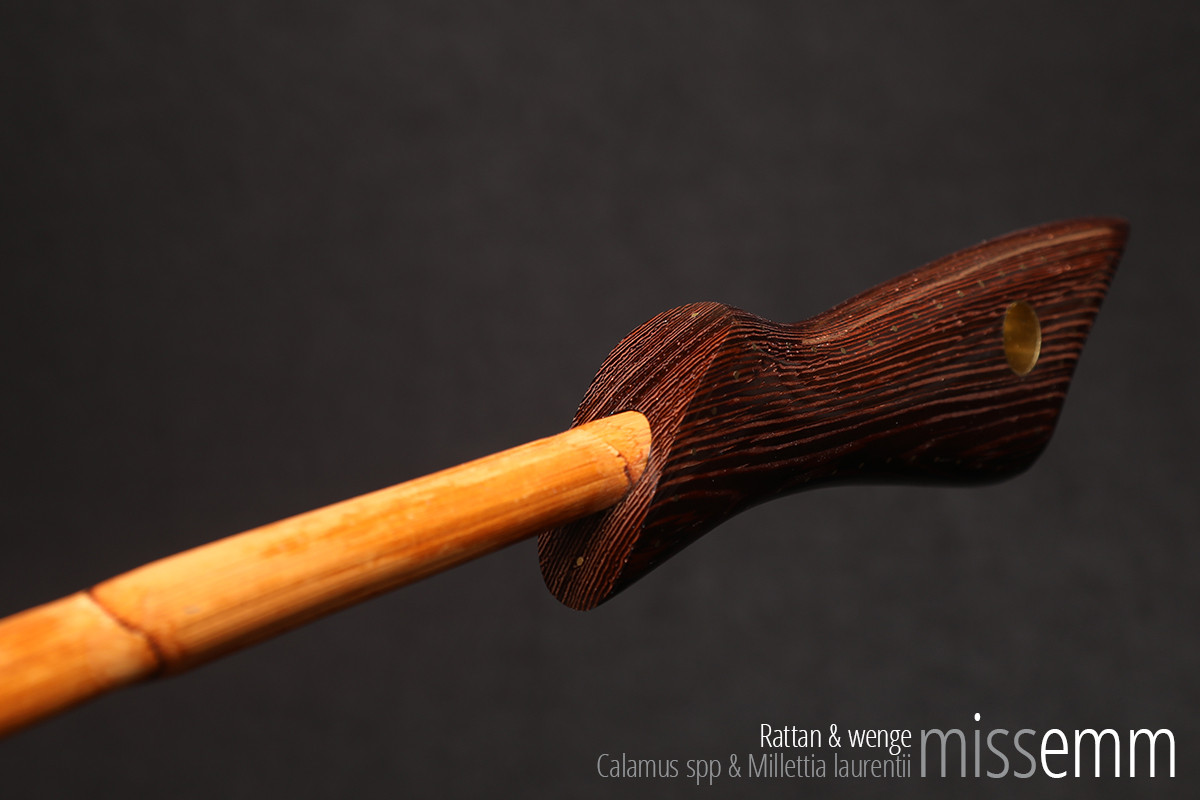 Unique bdsm impact toys | Rattan discipline cane | By Sydney fetish artisan Miss Emm | The shaft is rattan and the handle is hand crafted from wenge with brass details. | Perfect for impact play, bdsm corporal punishment scenes, and all sorts of kinky fun in the hands of a Mistress, Master, Domina, Dom, and anyone who enjoys caning.