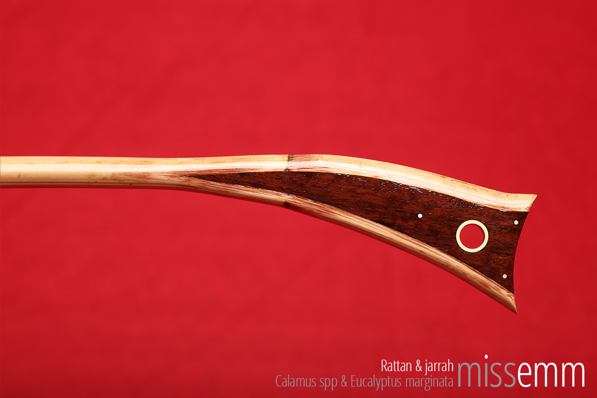 Handcrafted bdsm toys | Rattan spanking cane | By Sydney fetish artisan Miss Emm | The shaft is rattan and the handle is made from jarrah with brass details. | Perfect for impact play, bdsm corporal punishment scenes, and all sorts of kinky fun in the hands of a Mistress, Master, Domina, Dom, Top, or anyone who enjoys caning.