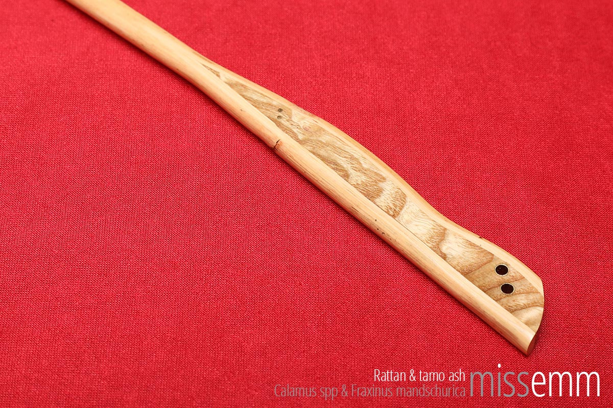 Handmade bdsm kink toys | Rattan punishment cane | By Sydney fetish artisan Miss Emm | The shaft is rattan and the handle is made from tamo ash with brass details. | Perfect for impact play, bdsm corporal punishment scenes, and all sorts of kinky fun in the hands of a Mistress, Master, Domina, Dom, Top, or anyone who enjoys caning.