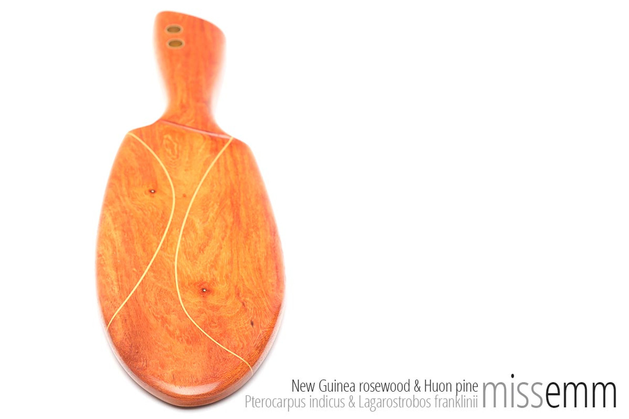Unique spanking toys | Wooden paddle | By fetish artisan Miss Emm | Handcrafted from New Guinea rosewood with Huon pine lines and brass details, this paddle will make a fine addition to your bdsm toybox.