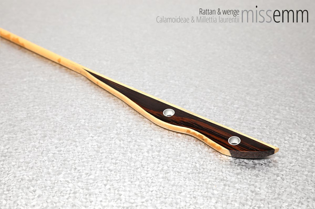 Unique handcrafted bdsm toys | Rattan spanking cane | By kink artisan Miss Emm | Made from rattan with a wenge handle and aluminium details |  A thin and whippy cane which will create a sharp sting with the flick of the wrist.