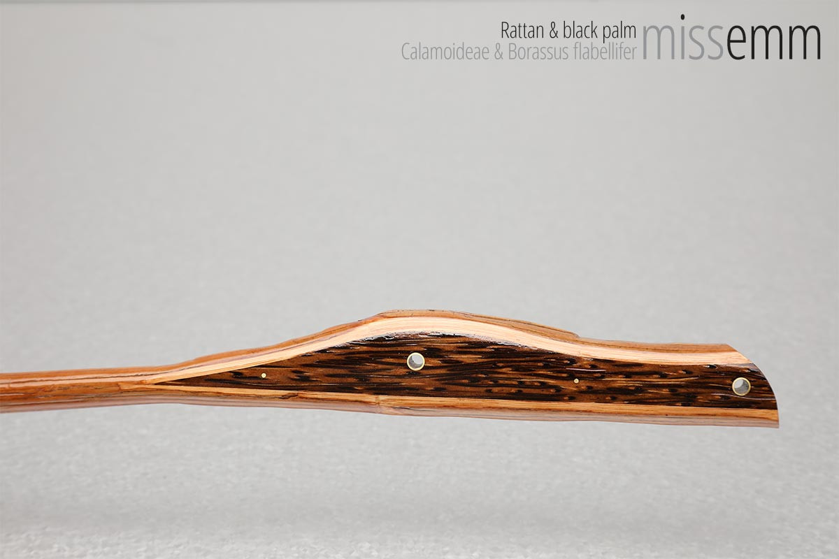 Unique handcrafted bdsm toys | Rattan spanking cane | By kink artisan Miss Emm | Made from rattan and black palm with brass details. If you like your kink toys unique, stylish, and functional then a Miss Emm cane will make the perfect addition to your collection.