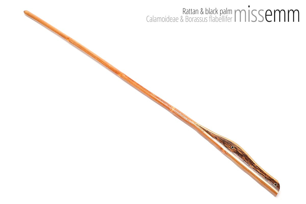 Unique handcrafted bdsm toys | Rattan spanking cane | By kink artisan Miss Emm | Made from rattan and black palm with brass details. If you like your kink toys unique, stylish, and functional then a Miss Emm cane will make the perfect addition to your collection.