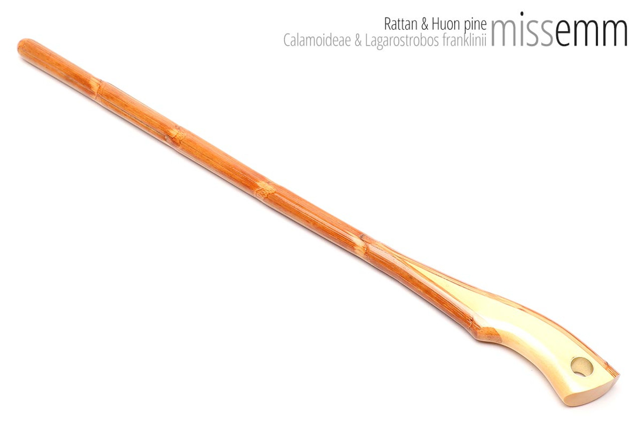 Unique handmade bdsm toys | Spanking cane | By fetish artisan Miss Emm | Made from rattan with a Huon pine handle and brass details | For Mistresses, Masters, Dommes, Dominas, Doms, kinksters, masochists, caning enthusiasts, subs, slaves, CP enthusiasts, and anyone who loves beautiful canes. 