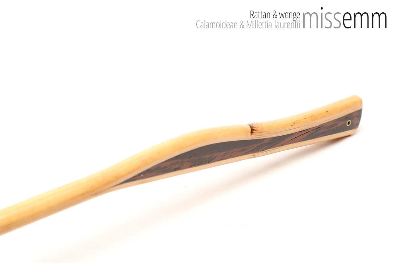 Unique handcrafted bdsm toys | Rattan spanking cane | By kink artisan Miss Emm | The shaft is rattan cane and the handle has been handcrafted from wenge with brass details.