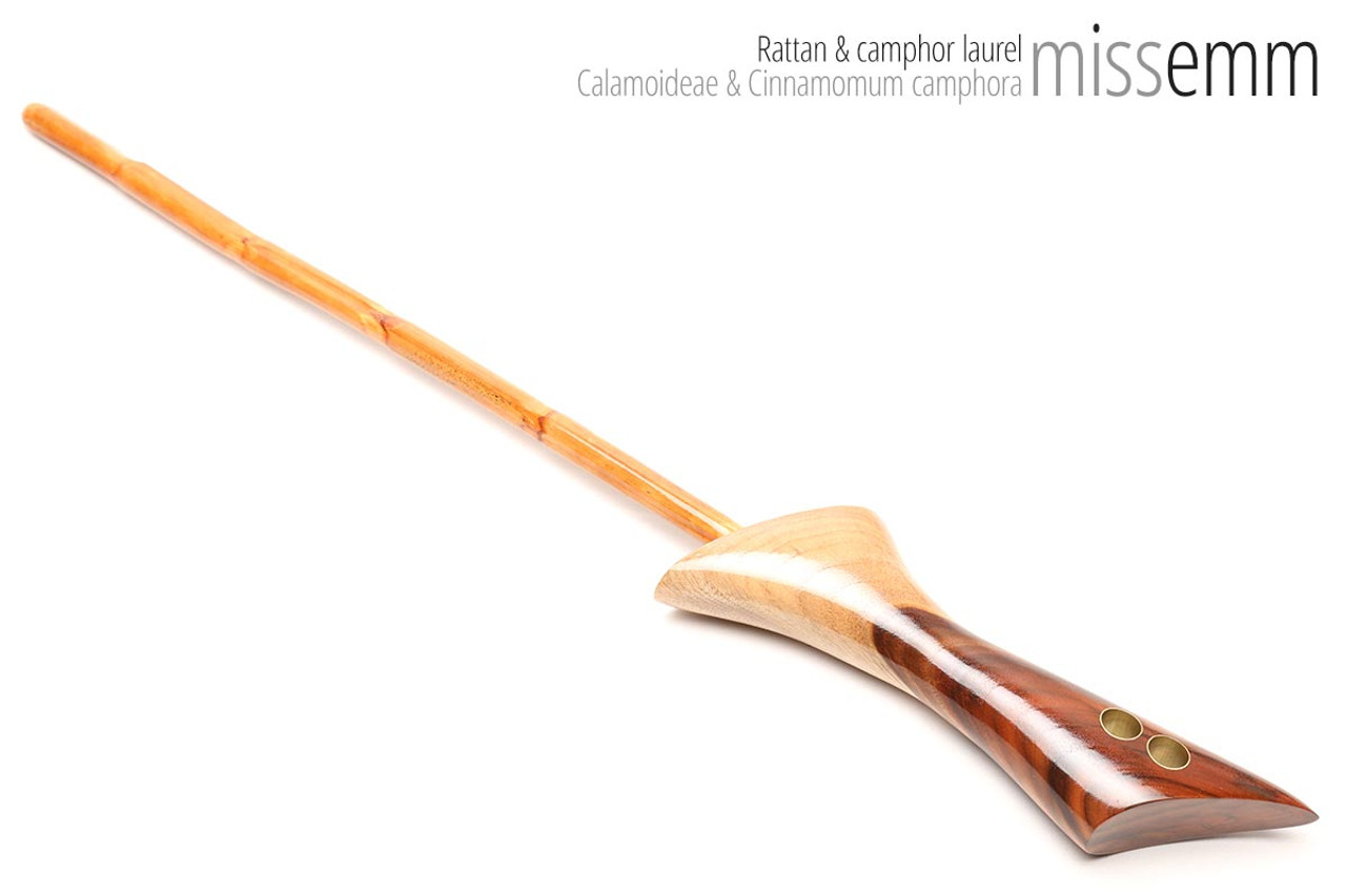 Unique handcrafted bdsm toys | Rattan spanking cane | By kink artisan Miss Emm | The shaft is rattan cane and the handle has been handcrafted from camphor laurel with brass details.