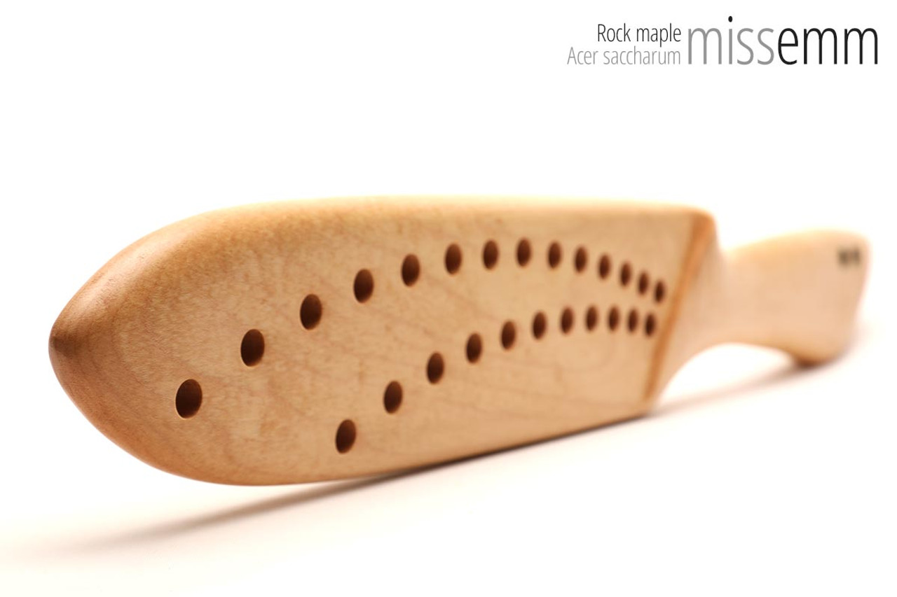 Unique handcrafted bdsm toys | Wooden spanking paddle with holes | Made from rock maple with brass details | This paddle was created by Sydney fetish artisan woodworker Miss Emm in her inner west workshop - where the finest wooden kink toys are brought to life. 