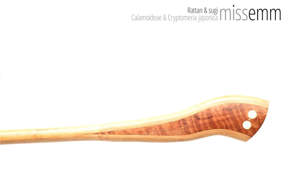 Unique handcrafted bdsm toys | Rattan spanking cane | By kink artisan Miss Emm | The shaft is rattan cane and the handle has been handcrafted from Japanese cedar with brass details.