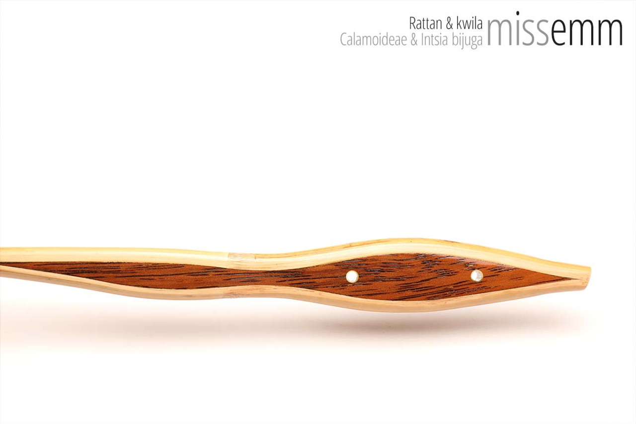 Unique handcrafted bdsm toys | Rattan spanking cane | By kink artisan Miss Emm | The shaft is rattan cane and the handle has been handcrafted from Kwila with brass details.