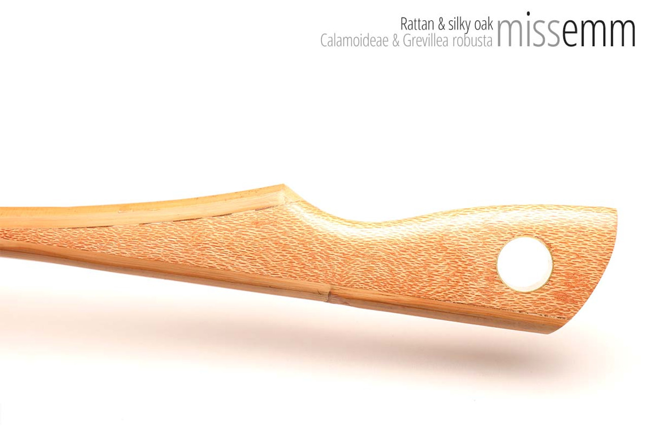 Unique handcrafted bdsm toys | Rattan spanking cane | By kink artisan Miss Emm | The shaft is rattan cane and the handle has been handcrafted from silky oak with brass details.