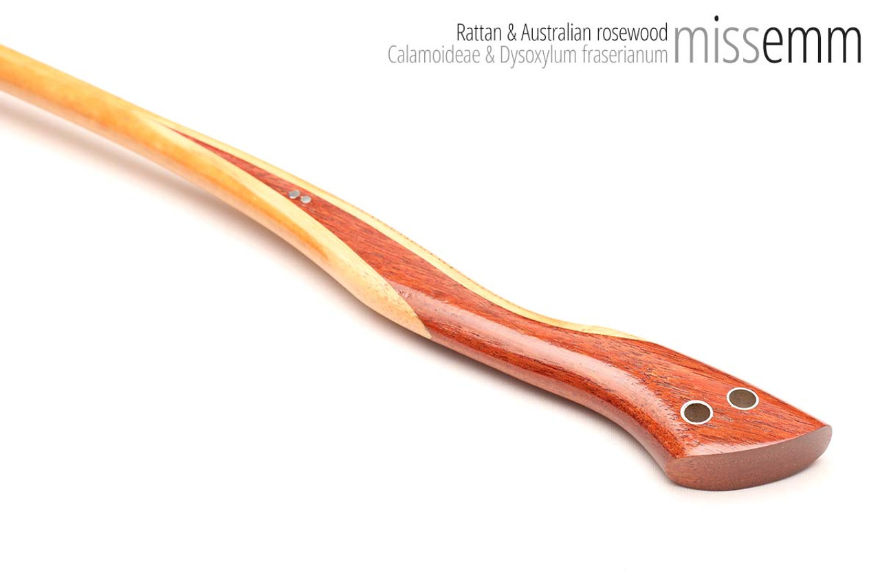 Unique handcrafted bdsm toys | Rattan spanking cane | By kink artisan Miss Emm | The shaft is rattan cane and the handle has been handcrafted from Australian rosewood with aluminium details.