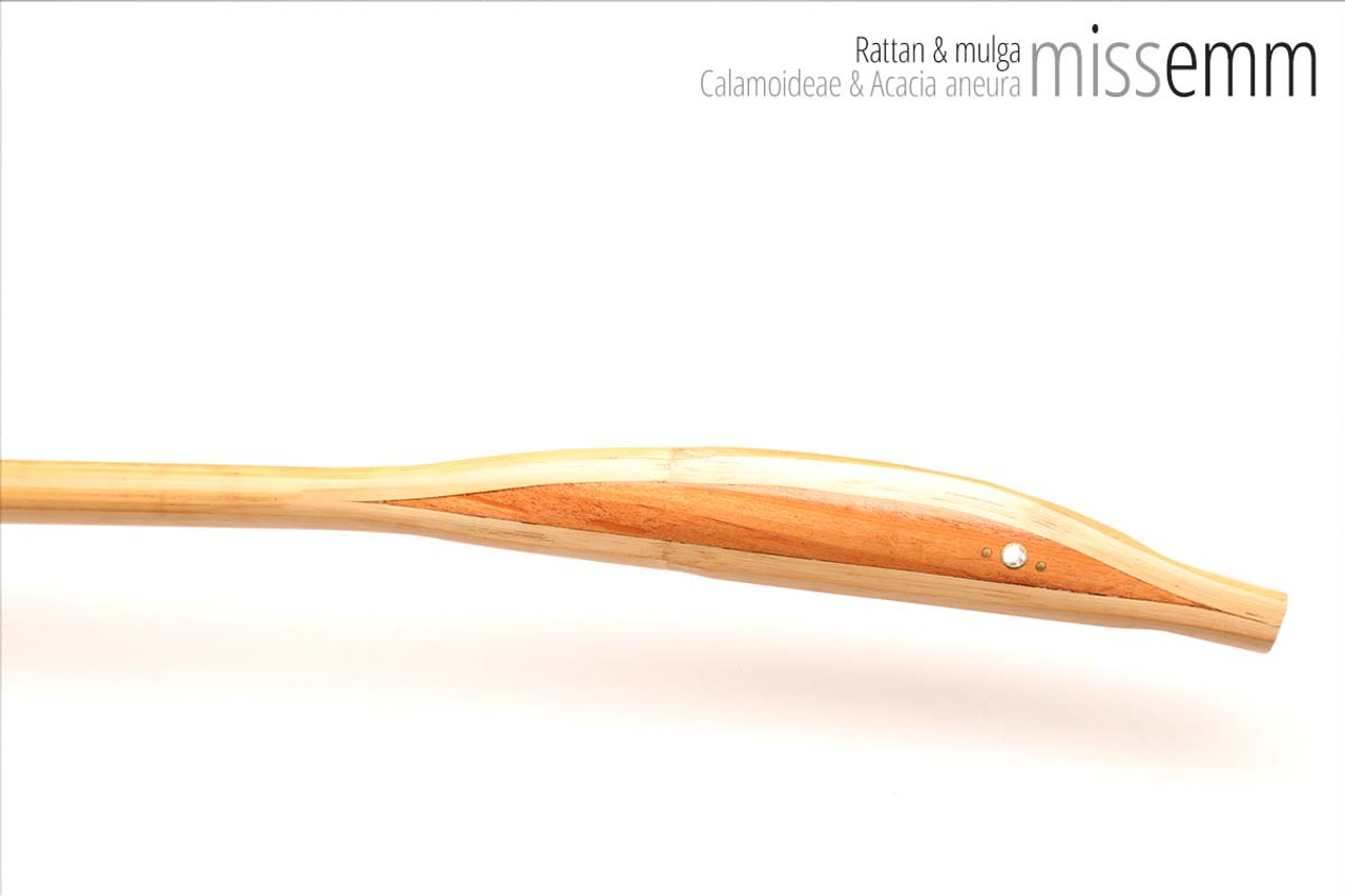 Unique handcrafted bdsm toys | Rattan spanking cane | By kink artisan Miss Emm | The shaft is rattan cane and the handle has been handcrafted from mulga with brass details.
