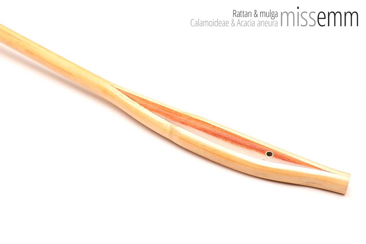 Unique handcrafted bdsm toys | Rattan spanking cane | By kink artisan Miss Emm | The shaft is rattan cane and the handle has been handcrafted from mulga with brass details.