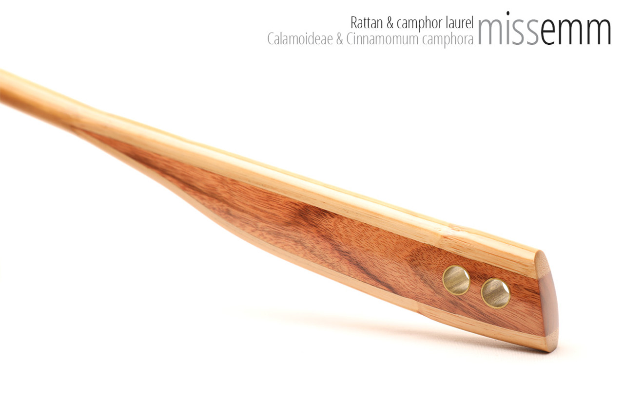 Unique handcrafted bdsm toys | Rattan spanking cane | By kink artisan Miss Emm | The shaft is rattan cane and the handle has been handcrafted from camphor laurel with brass details.