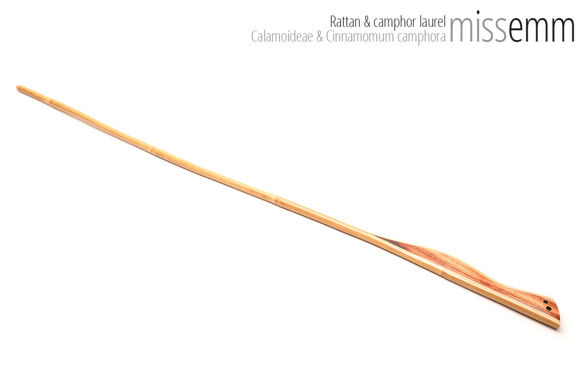 Unique handcrafted bdsm toys | Rattan spanking cane | By kink artisan Miss Emm | The shaft is rattan cane and the handle has been handcrafted from camphor laurel with brass details.