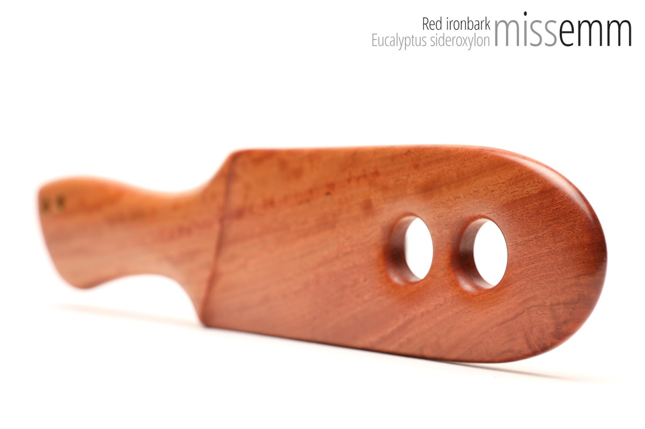 Unique handcrafted bdsm toys | Wooden spanking paddle | By kink artisan Miss Emm | Made from NSW ironbark with brass details.