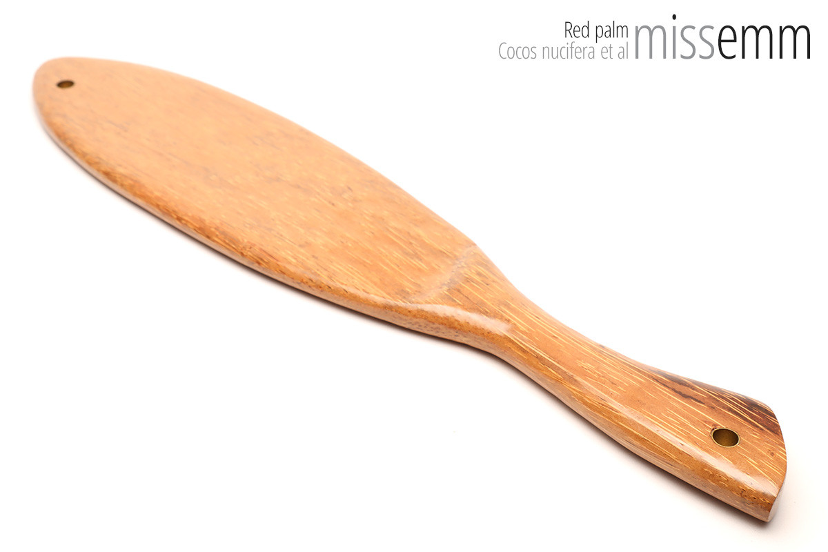 Unique handcrafted bdsm toys | Wooden spanking paddle | By kink artisan Miss Emm | Made from red palm with brass details.