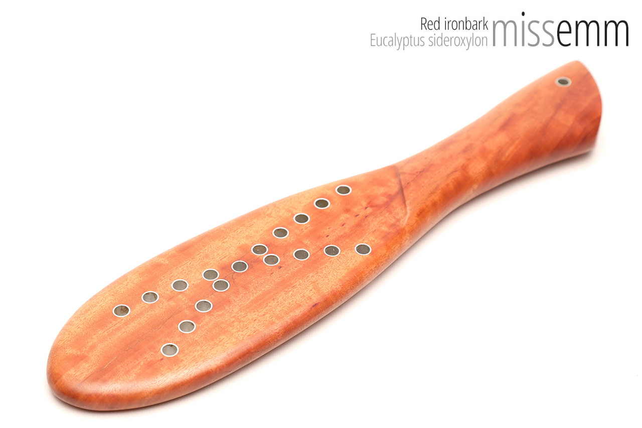Unique handcrafted bdsm toys | Wooden spanking paddle | By kink artisan Miss Emm | Made from NSW ironbark with aluminium details.