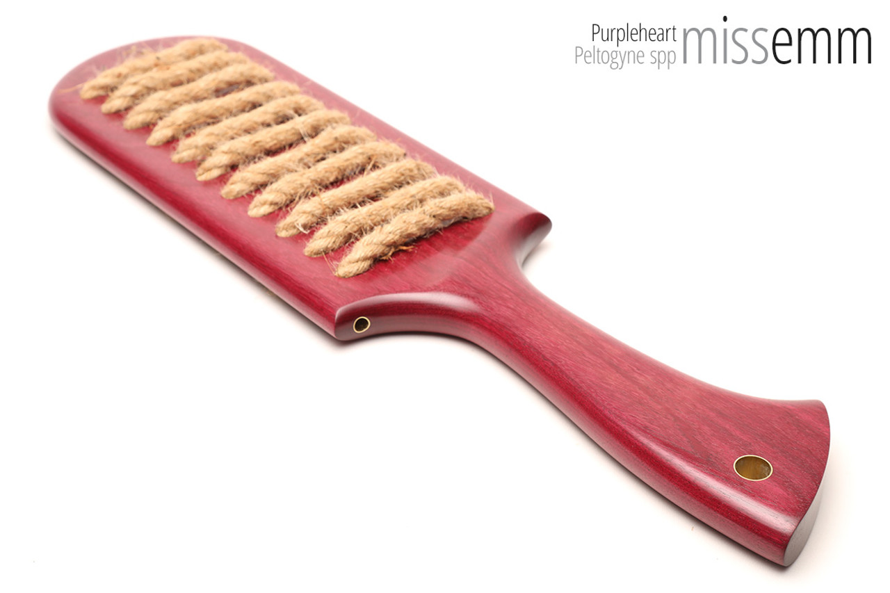 Unique handcrafted bdsm toys | Wooden spanking paddle | By kink artisan Miss Emm | Made from purpleheart with brass details.