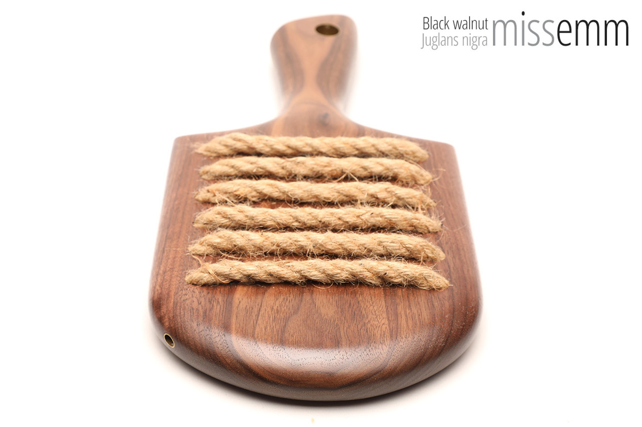 Unique handcrafted bdsm toys | Wooden spanking paddle | By kink artisan Miss Emm | Made from black walnut with brass details.
