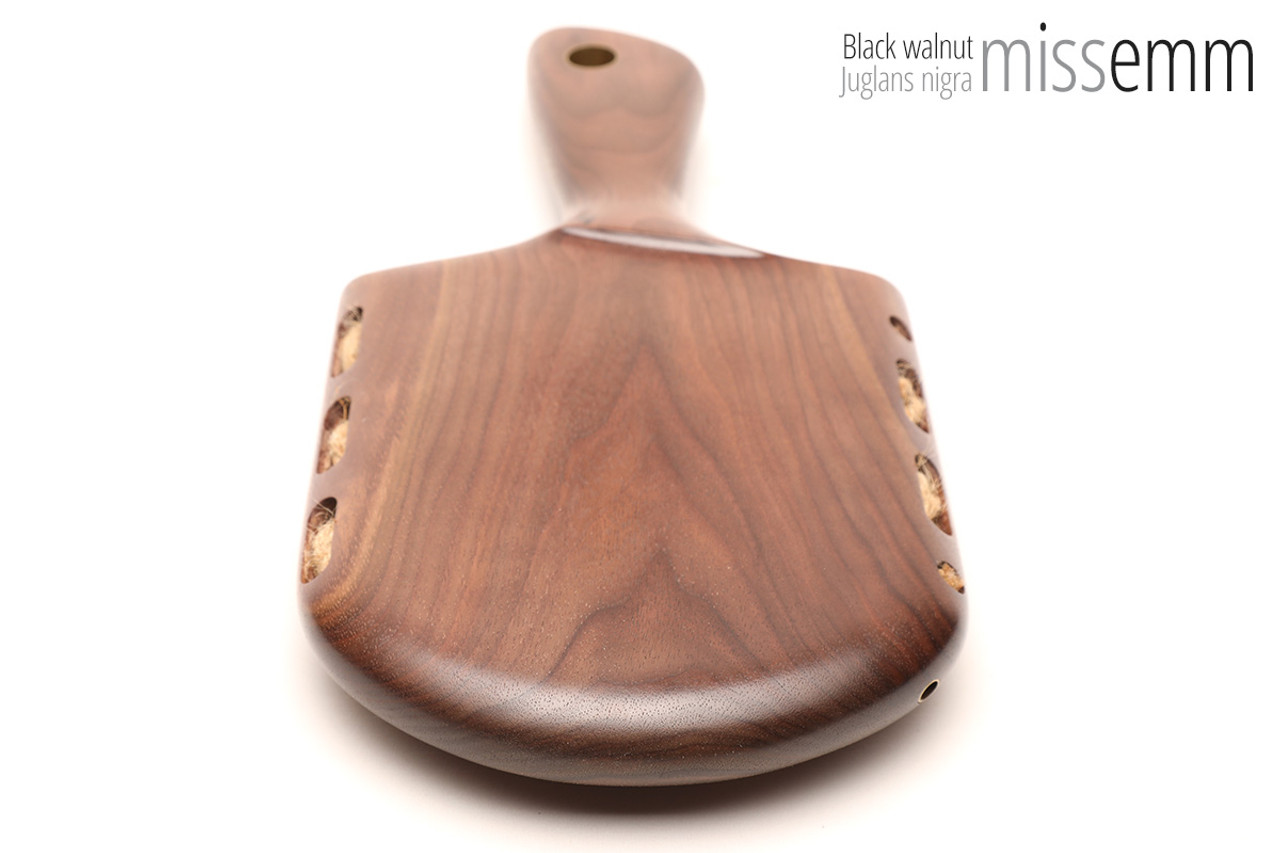 Unique handcrafted bdsm toys | Wooden spanking paddle | By kink artisan Miss Emm | Made from black walnut with brass details.