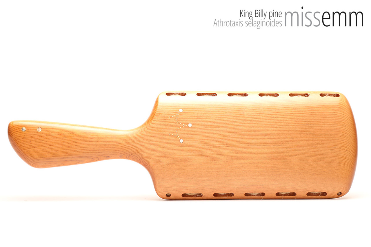 Unique handcrafted bdsm toys | Wooden spanking paddle | By kink artisan Miss Emm | Made from King Billy pine with brass details.