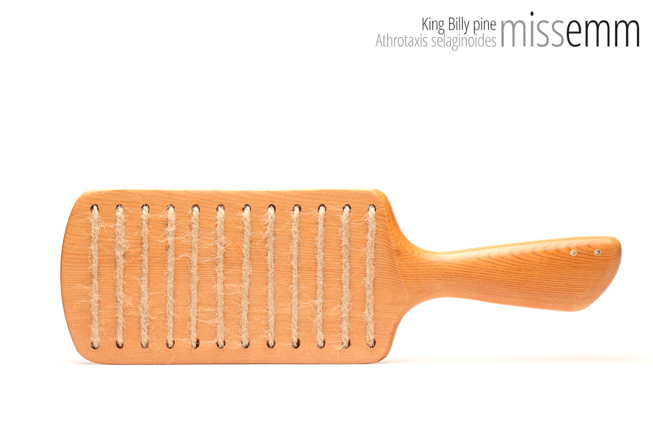 Unique handcrafted bdsm toys | Wooden spanking paddle | By kink artisan Miss Emm | Made from King Billy pine with brass details.