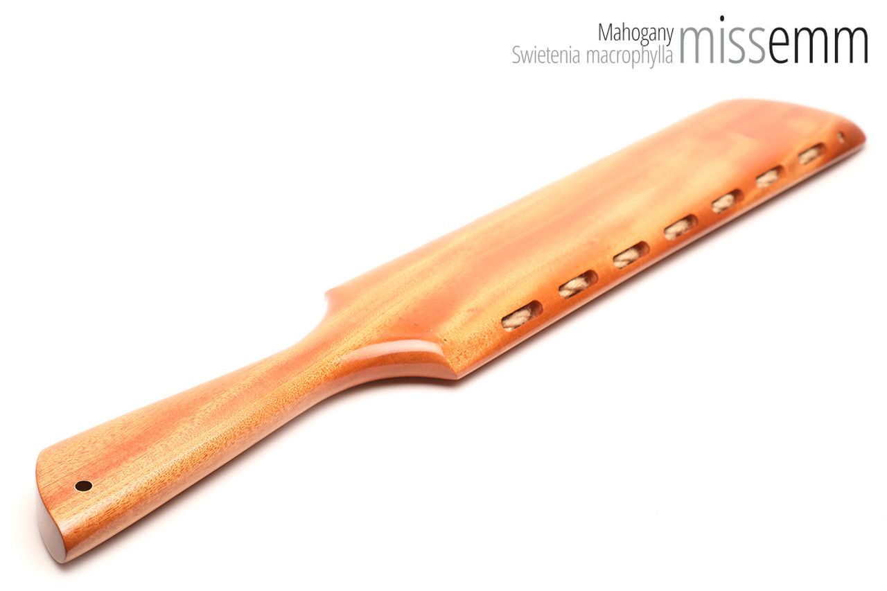 Unique handcrafted bdsm toys | Wooden spanking paddle | By kink artisan Miss Emm | Made from mahogany with brass details.