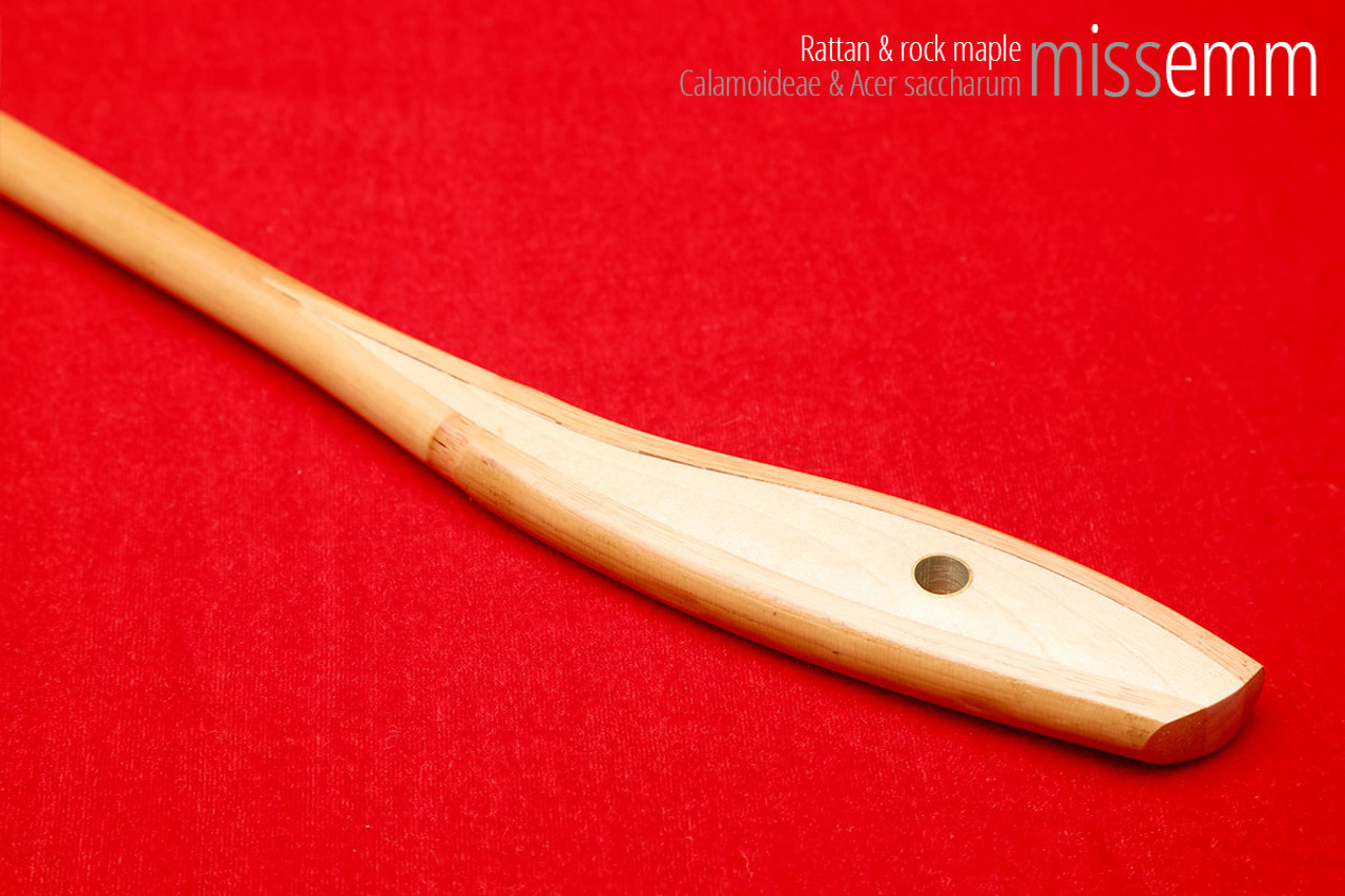 Handmade bdsm toys | Rattan cane | By kink artisan Miss Emm | The cane shaft is rattan cane and the handle has been handcrafted from rock maple with brass details.