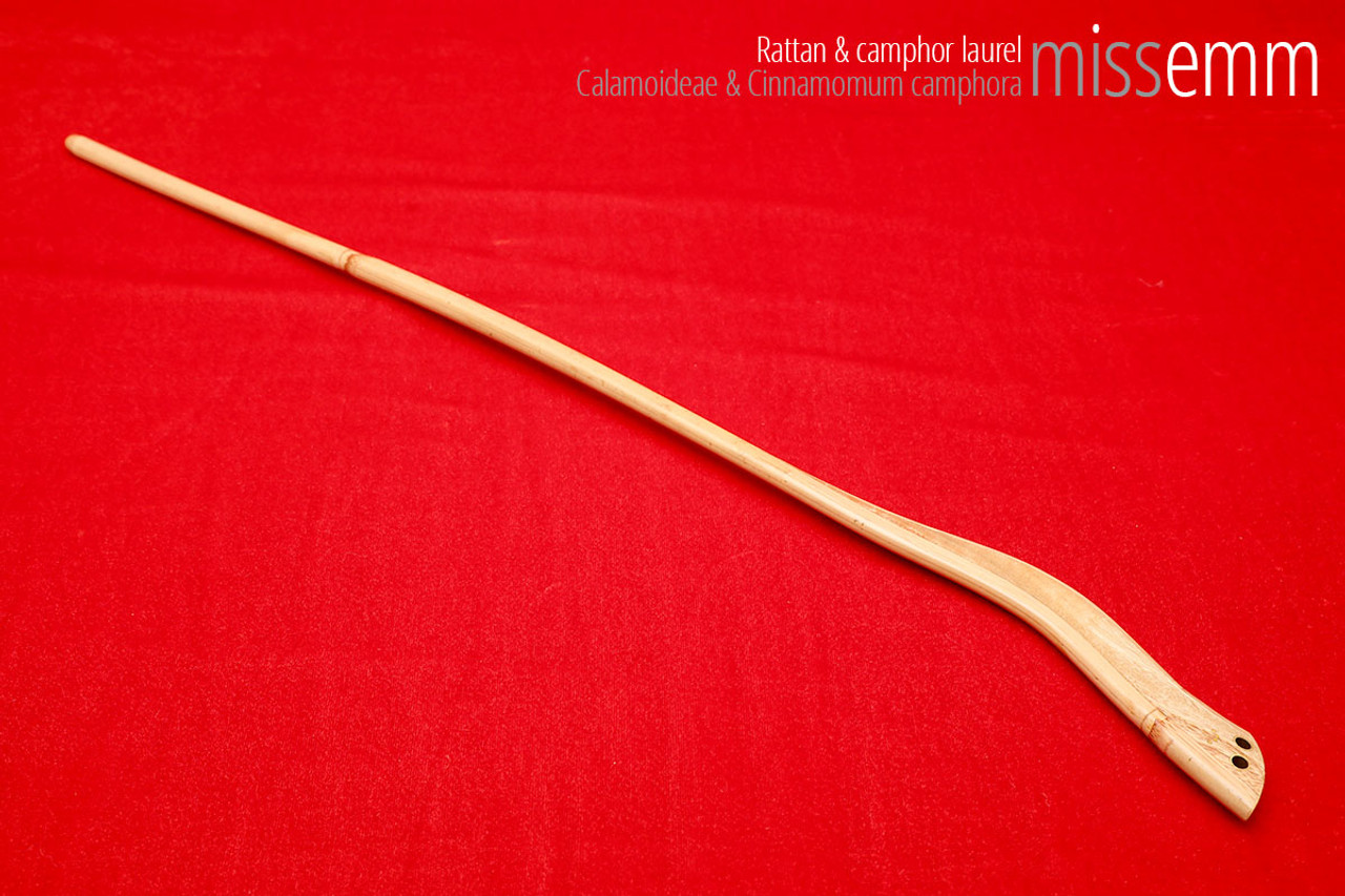 Handmade bdsm toys | Rattan cane | By kink artisan Miss Emm | The cane shaft is rattan cane and the handle has been handcrafted from camphor laurel with brass details.