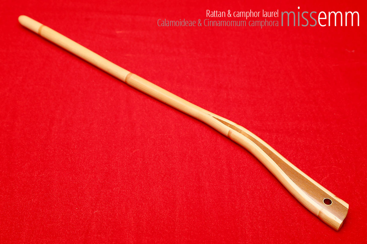 Handmade bdsm toys | Rattan cane | By kink artisan Miss Emm | The cane shaft is rattan cane and the handle has been handcrafted from camphor laurel with brass details.