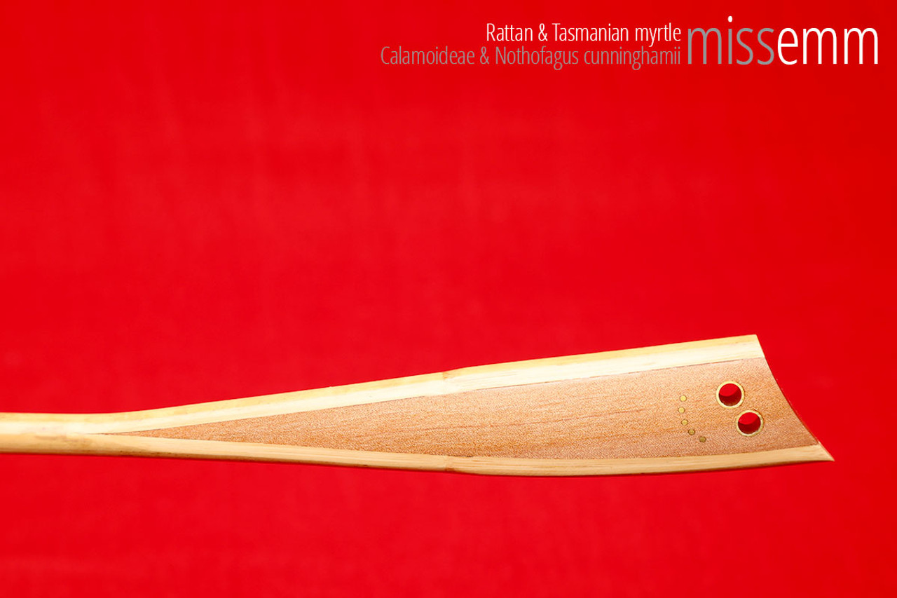 Handmade bdsm toys | Rattan cane | By kink artisan Miss Emm | The cane shaft is rattan cane and the handle has been handcrafted from myrtle with brass details.