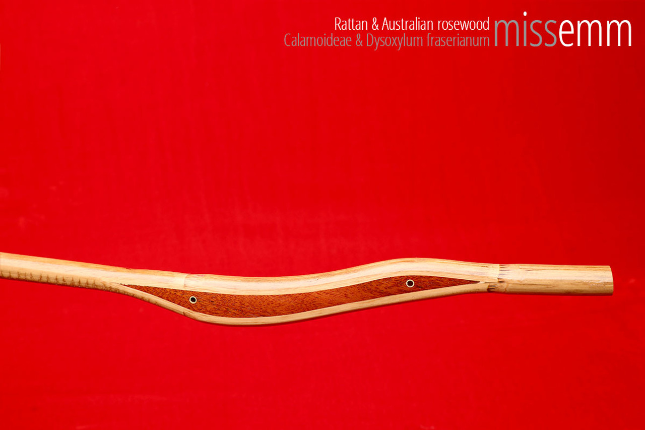 Handmade bdsm toys | Rattan cane | By kink artisan Miss Emm | The cane shaft is rattan cane and the handle has been handcrafted from Australian rosewood with brass details.