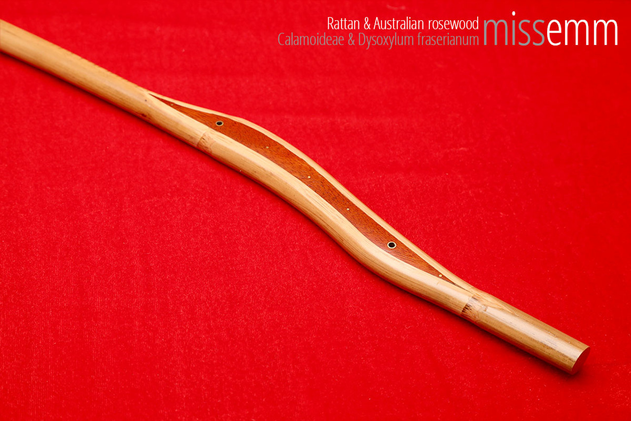 Handmade bdsm toys | Rattan cane | By kink artisan Miss Emm | The cane shaft is rattan cane and the handle has been handcrafted from Australian rosewood with brass details.