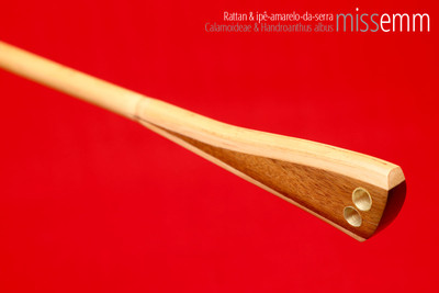 Handmade bdsm toys | Rattan cane | By kink artisan Miss Emm | The cane shaft is rattan cane and the handle has been handcrafted from ipê-amarelo-da-serra with brass details.