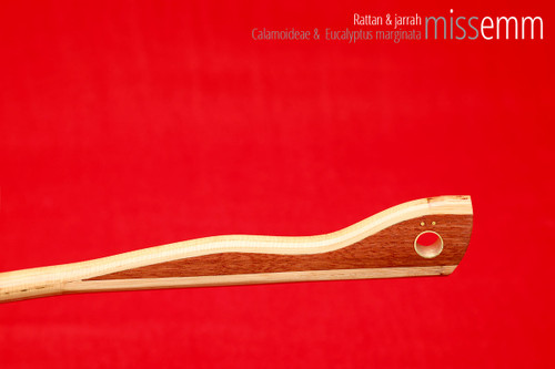 Handmade bdsm toys | Rattan cane | By kink artisan Miss Emm | The cane shaft is rattan cane and the handle has been handcrafted from jarrah with brass details.