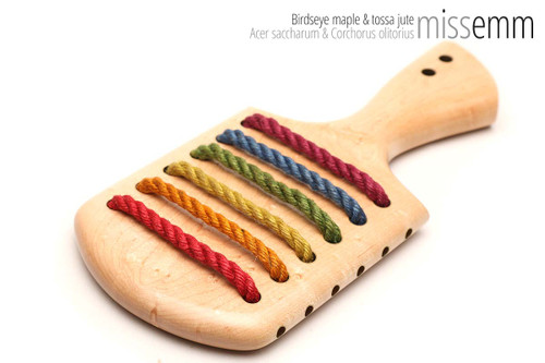 Unique handcrafted spanking toys | Wooden paddle | By kink artisan Miss Emm | Made from birdseye maple and jute with brass details.