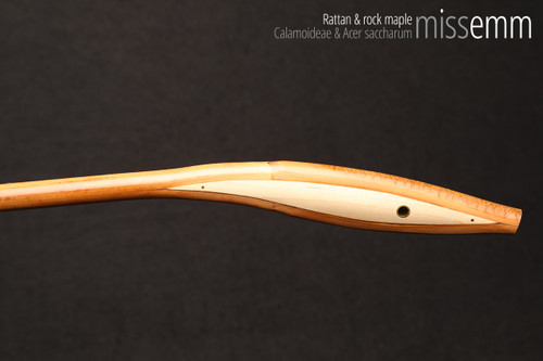 Handmade bdsm toys | Rattan cane | By kink artisan Miss Emm | The cane shaft is rattan cane and the handle has been handcrafted from rock maple with brass details.