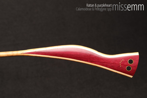 Handmade bdsm toys | Rattan cane | By kink artisan Miss Emm | The cane shaft is rattan cane and the handle has been handcrafted from purpleheart with brass details.