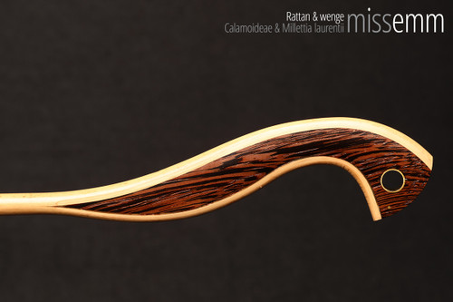 Handmade bdsm toys | Rattan cane | By kink artisan Miss Emm | The cane shaft is rattan cane and the handle has been handcrafted from wenge with brass details.
