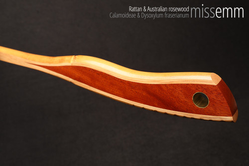 Unique spanking toys | Rattan pane (flat bladed cane) | By kink artisan Miss Emm | The shaft is made from rattan cane and the handle has been handcrafted from Australian rosewood with brass details.