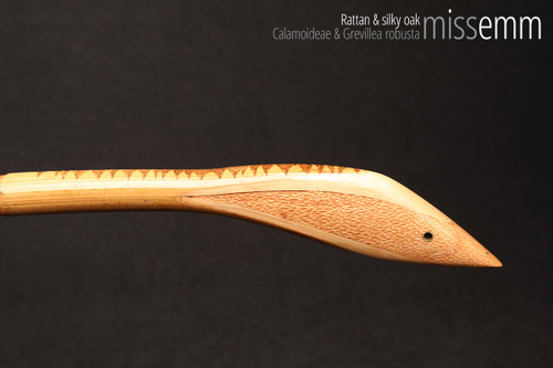 Unique spanking toys | Rattan pane (flat bladed cane) | By kink artisan Miss Emm | The shaft is made from rattan cane and the handle has been handcrafted from silky oak with brass details.